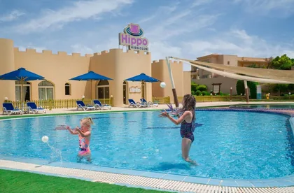 Children playing in the shallow family pool