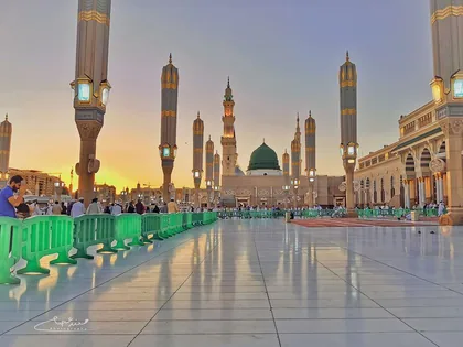 The mosque courtyard and its canopy columns at sunset
