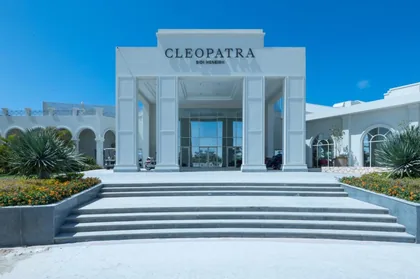The white Cleopatra entrance facade above its stepped forecourt