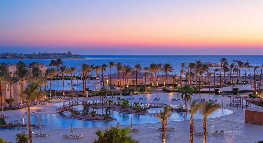 Cleopatra Luxury Resort Makadi Bay exterior at sunset