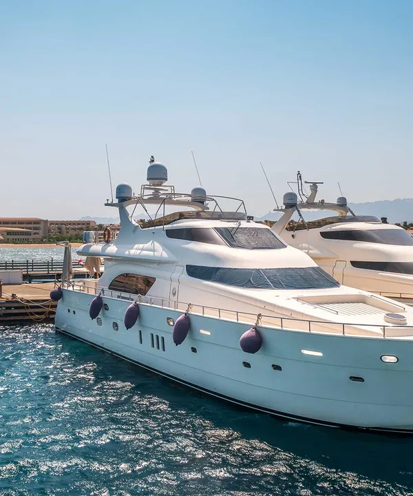 Two luxury motor yachts moored at the Makadi Bay pier